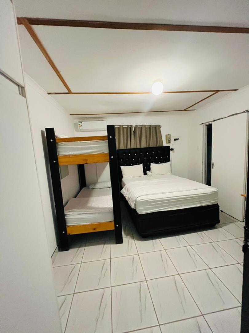 Family Room at Tse Yaa Kuku with double bed and bunk beds